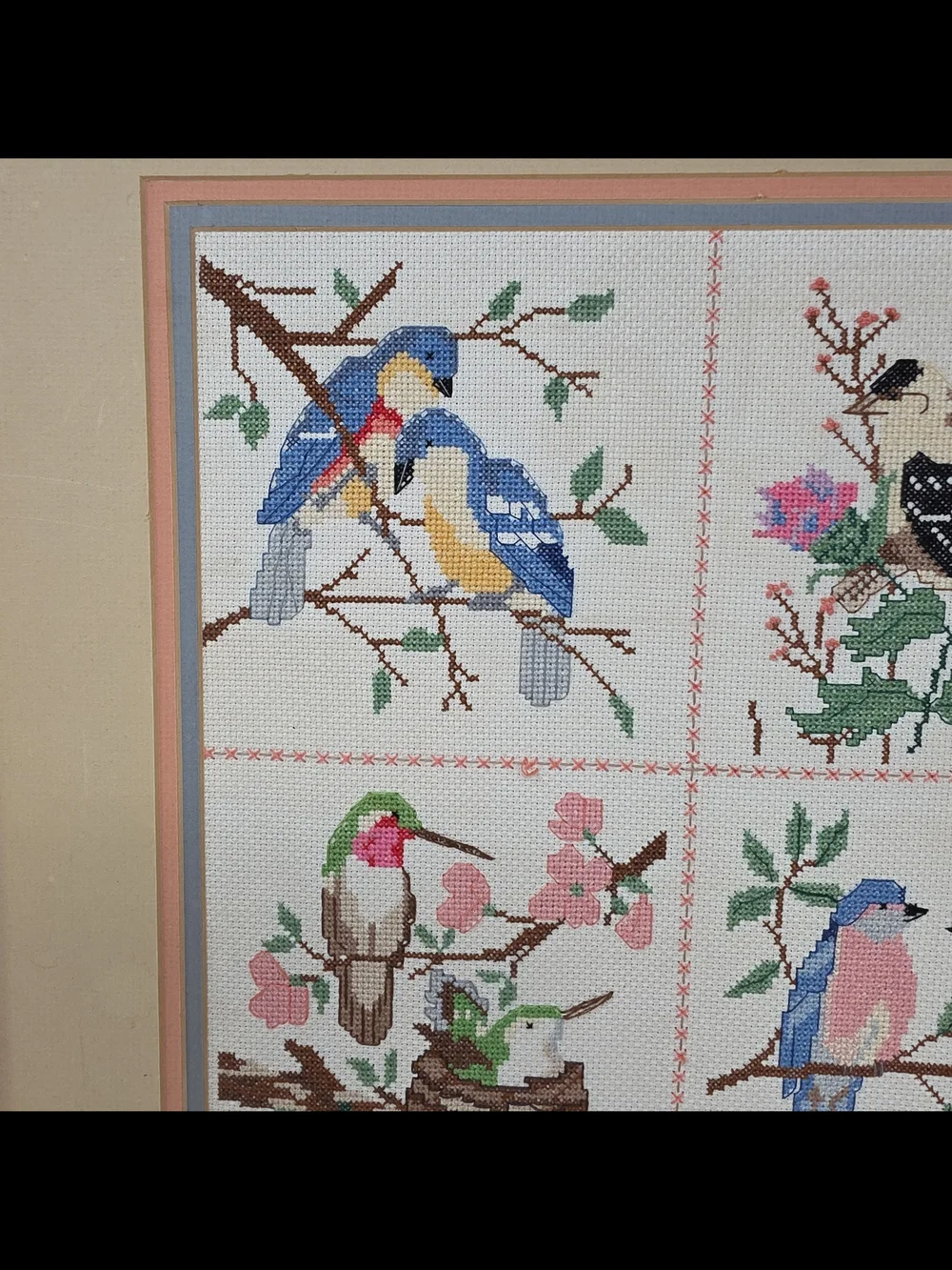 Framed Four-Panel Bird Cross-Stitch Wall Art in Blue, Pink & Green